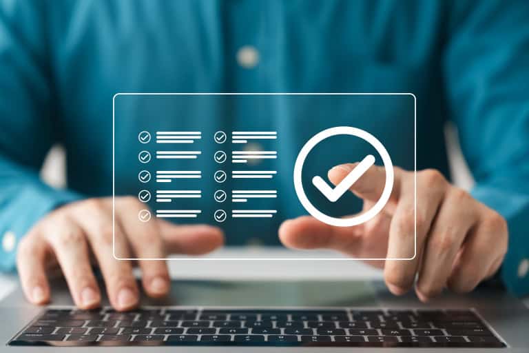 A man's hand clicking on a digital screen to use Web Session Manager, which allows companies to ensure a level of security that meets digital regulatory requirements.